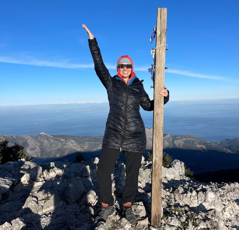 Alise Saunders at a mountain summit in Greece